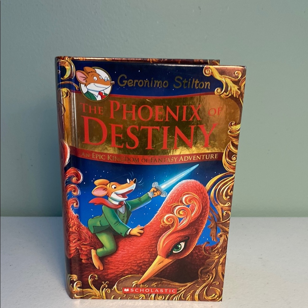 Scholastic's The Phoenix of Destiny - Vibrant Red and Gold Cover
